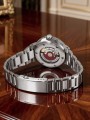 oris_aquis_01_733_7730_4137-07_8_24_05peb_green_dial_silver_bracelet_backside.jpg